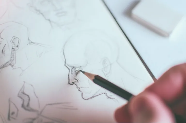 dessinateur sur papier ordinaire